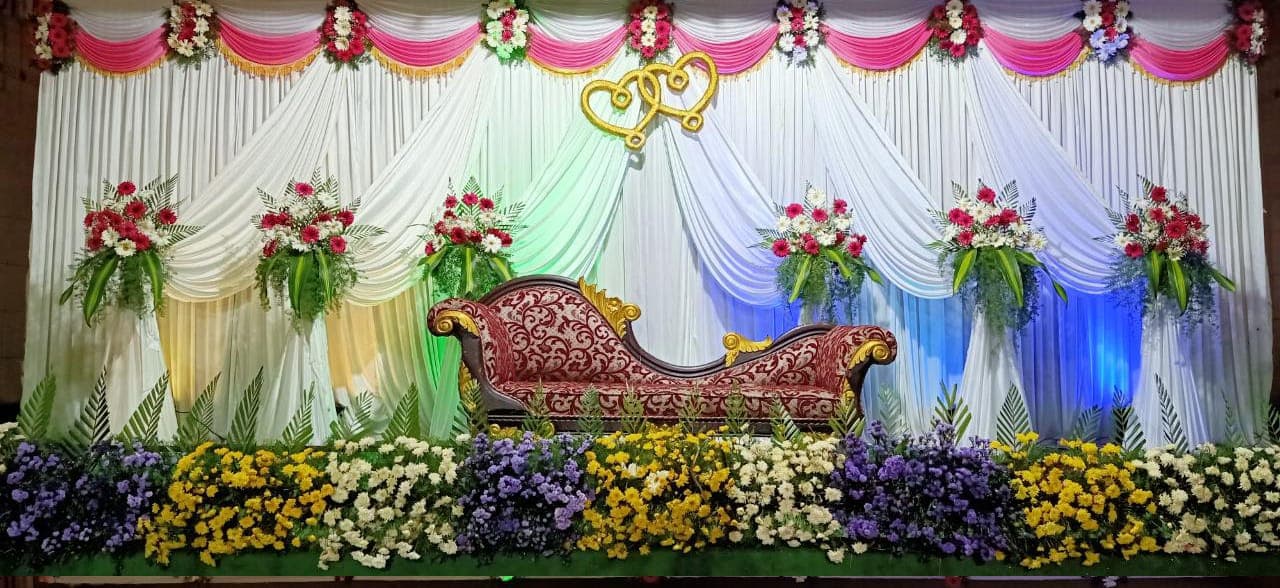 Moody stage with greenery and blue lighting