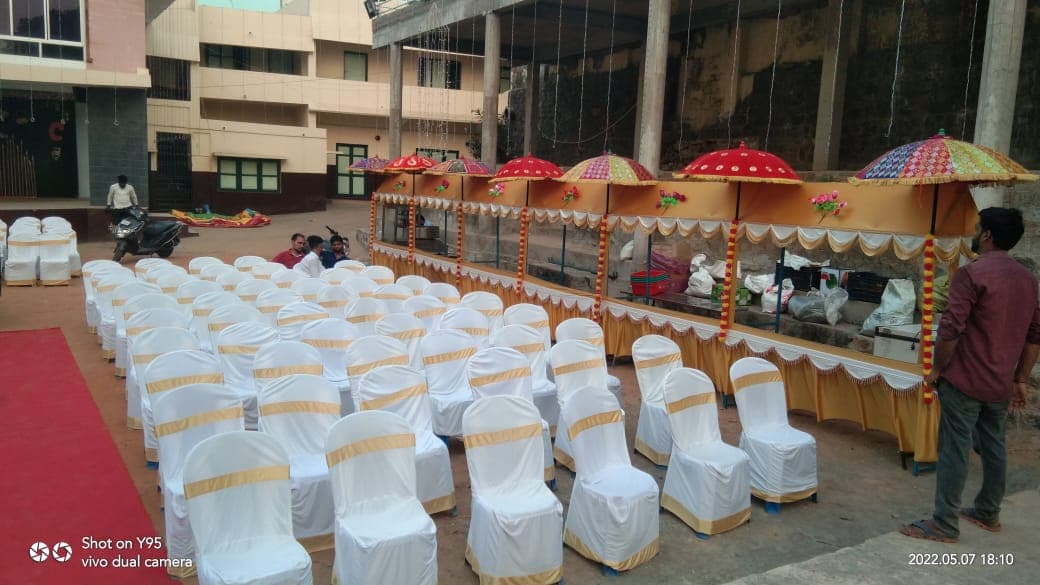 Golden elegance stage with fairy lights and Ganesha